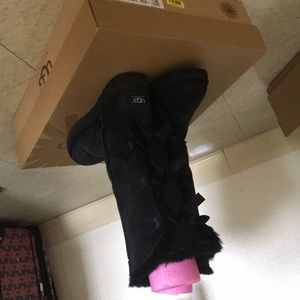 UGGS, tall, bow tied back size 8 color black